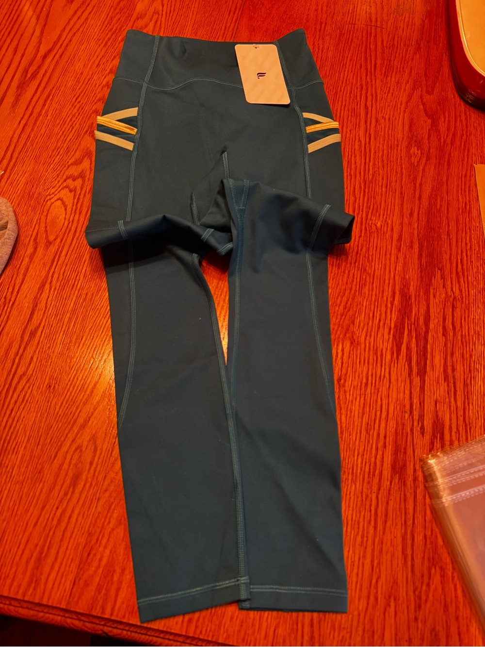 Fabletics Teal Trinity High Waisted Pocket 7/8 Leggings with Yellow Stripes